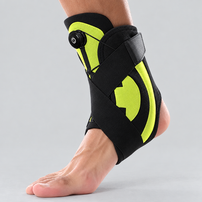 Ankletica adjustable dial ankle brace in neon yellow, side view worn on foot